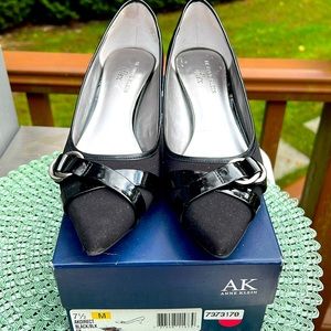 Preowned and loved Anne Klein black pumps. Size 7.5. Priced to sell.